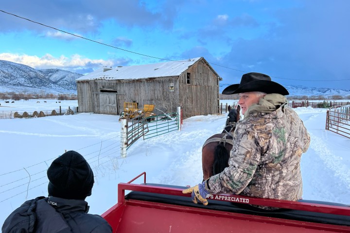 a man riding on the back of a boat