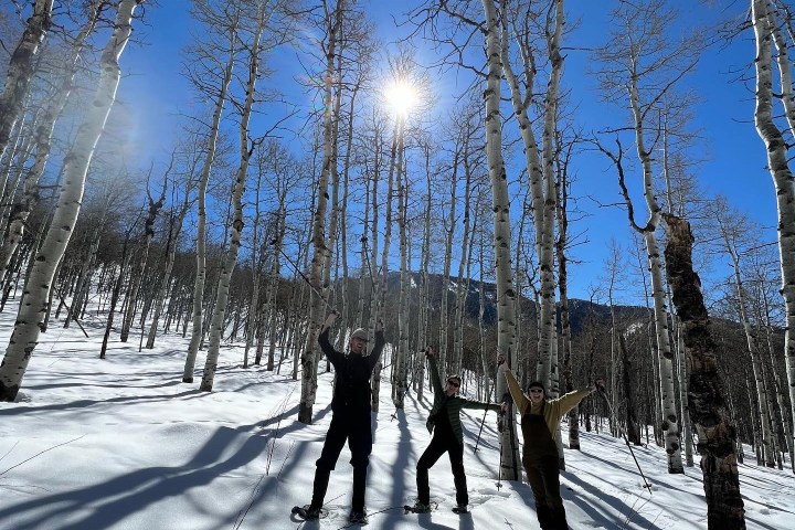 a man is cross country skiing in the snow