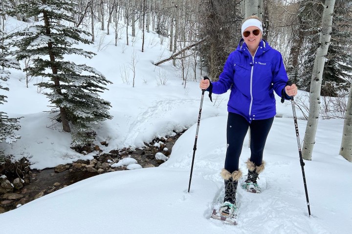 a man is cross country skiing in the snow