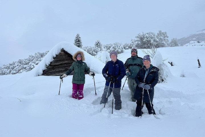 a group of people snowshoeing in Utah