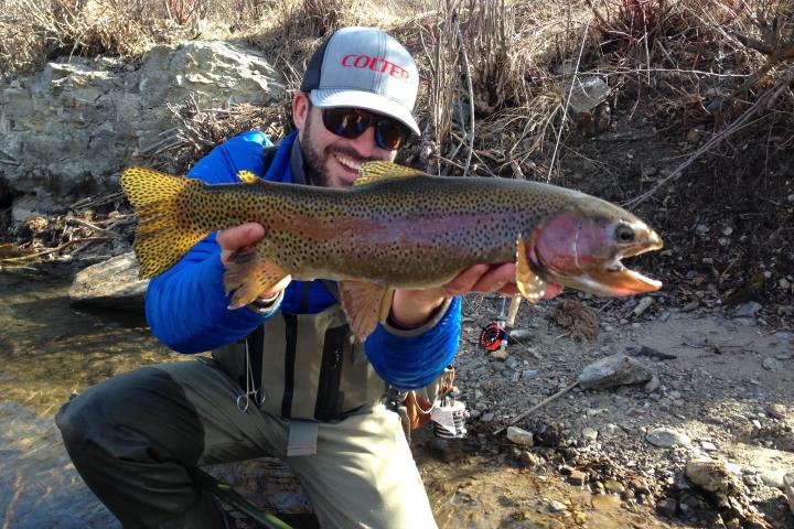 a person holding a fish