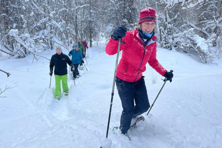 a person snowshoeing on a private ranch