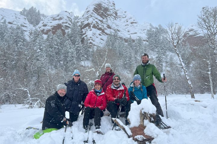 a group of people snowshoeing in Morgan Utah