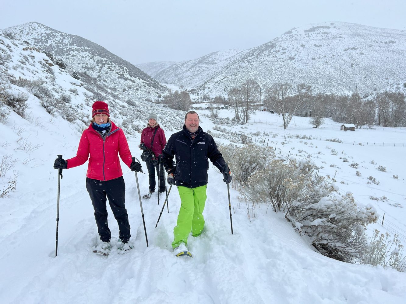 a group of people snowshoeing in Lost Creek Utah